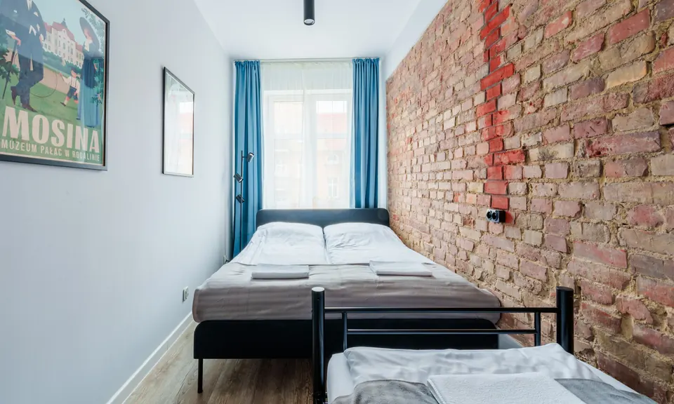 Beds against the brick wall
