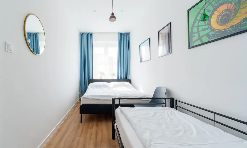 Bedroom with a double and a single bed